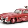 MB 300 SL Mit Ski Und Figur Von Schuco 1 MB 300 SL Mit Ski Und Figur Von Schuco -Kunst Textilpflanzen Verkäufe mb 300 sl mit ski und figur von schuco farbe rot